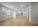 Bright kitchen features white cabinets, stainless steel appliances and a large island offering ample counter space at 5 Dew Drop Pt, Dallas, GA 30157
