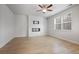 Bright living room features hard wood floors, fireplace, and a ceiling fan for comfortable living at 5 Dew Drop Pt, Dallas, GA 30157