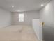 Upstairs loft with carpet flooring and a window with natural light at 5 Dew Drop Pt, Dallas, GA 30157