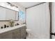 Bathroom features a double sink vanity with shower and tub combination at 511 Laird Rd, Hiram, GA 30141