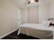 Bedroom featuring hardwood floors and a window at 511 Laird Rd, Hiram, GA 30141