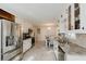 Bright, eat-in kitchen features stainless steel appliances and granite countertops at 511 Laird Rd, Hiram, GA 30141