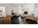 Elegant living room with hardwood floors, fireplace, and neutral tones at 511 Laird Rd, Hiram, GA 30141