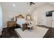 Vaulted ceiling primary bedroom with ornate furniture and ensuite bathroom at 511 Laird Rd, Hiram, GA 30141