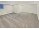 Bright basement boasts neutral carpeting, recessed lighting and natural light at 2688 Kelly Cove Dr, Buford, GA 30519