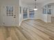 Open concept dining room offers a pendant light fixture and large windows at 2688 Kelly Cove Dr, Buford, GA 30519