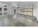 Spacious two car garage with finished walls and two windows at 2688 Kelly Cove Dr, Buford, GA 30519