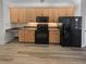 Spacious kitchen with wood cabinets, granite countertops, and modern appliances at 2688 Kelly Cove Dr, Buford, GA 30519