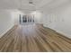 Bright and airy living room featuring wood floors and a double patio door at 2688 Kelly Cove Dr, Buford, GA 30519
