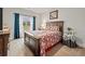 Cozy bedroom with a large window, plush carpeting, and a comfortable-looking bed at 4030 Amberhill Cir, Cumming, GA 30040