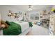 Neutral secondary bedroom with ceiling fan and a large window with backyard views at 4030 Amberhill Cir, Cumming, GA 30040