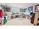 Bright bedroom with sports memorabilia, and a large window overlooking the backyard at 4030 Amberhill Cir, Cumming, GA 30040