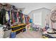 Spacious walk-in closet with ample storage and natural light at 4030 Amberhill Cir, Cumming, GA 30040