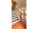 Open floorplan with wood floors, staircase, and windows at 5905 Brookside Oak Cir, Norcross, GA 30093
