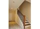 An interior shot of a home's staircase featuring wood and iron accents at 5905 Brookside Oak Cir, Norcross, GA 30093
