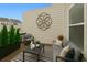 Private back patio is perfect for relaxing outdoors or entertaining guests with stylish furniture at 1165 Millennium Park Rd, Decatur, GA 30033