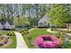 Community pool and clubhouse with manicured landscaping, offering residents a relaxing retreat at 1165 Millennium Park Rd, Decatur, GA 30033