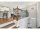 Foyer provides a view into dining and kitchen spaces, showing hardwood floors, neutral walls and plenty of natural light at 1165 Millennium Park Rd, Decatur, GA 30033