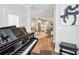Open floor plan showcasing the living room and kitchen with a piano room at 1165 Millennium Park Rd, Decatur, GA 30033