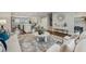 Open-concept living room boasts natural light, hardwood floors, and flows into the kitchen at 1165 Millennium Park Rd, Decatur, GA 30033