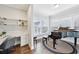 Bright office with built-in desk, shelving, and piano at 1165 Millennium Park Rd, Decatur, GA 30033