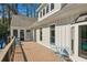 Outdoor patio with seating and partially visible pool, ideal for relaxation and entertaining guests at 1165 Millennium Park Rd, Decatur, GA 30033