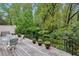 Serene back deck overlooking a lush, green backyard, perfect for outdoor dining and relaxation at 12 Braemore Dr, Atlanta, GA 30328