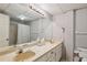Neutral bathroom with double sinks, large vanity, and shower/tub combo at 12 Braemore Dr, Atlanta, GA 30328