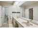 Bright bathroom with double sinks, a large mirror, and plenty of counter space at 12 Braemore Dr, Atlanta, GA 30328