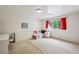 Large bedroom with a bed, dresser, side table, and plenty of floor space at 12 Braemore Dr, Atlanta, GA 30328
