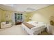 Comfortable bedroom with queen-sized bed and a view of the trees at 12 Braemore Dr, Atlanta, GA 30328