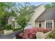 Beautiful townhome with lush landscaping and a well-maintained exterior, enhancing curb appeal at 12 Braemore Dr, Atlanta, GA 30328
