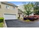Charming townhome with attached garage, beautiful landscaping, and inviting curb appeal at 12 Braemore Dr, Atlanta, GA 30328