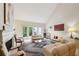 Elegant living room featuring a fireplace, comfortable seating, and sophisticated decor, creating a cozy ambiance at 12 Braemore Dr, Atlanta, GA 30328