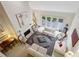 Airy living room with high ceilings, a fireplace, and large French doors leading to the backyard at 12 Braemore Dr, Atlanta, GA 30328