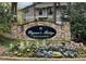 Wynne's Ridge community sign surrounded by colorful tulips and greenery, welcoming residents and guests at 1501 Wynnes Ridge Cir, Marietta, GA 30067