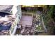 Backyard with a wood deck, foliage, and a stone patio at 2020 Kenwood Se Pl, Smyrna, GA 30082