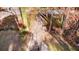 Aerial view of a driveway surrounded by mature trees at 2020 Kenwood Se Pl, Smyrna, GA 30082