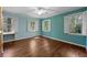 Bedroom with wood floors and shutters on multiple windows allowing for lots of light at 2049 Castleway Ne Ln, Atlanta, GA 30345