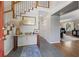 Bright foyer with staircase, console table, and views into the living room at 2049 Castleway Ne Ln, Atlanta, GA 30345