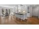 Bright, open kitchen with white cabinets, granite countertops, and bar seating at 2049 Castleway Ne Ln, Atlanta, GA 30345