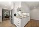Well-appointed kitchen with white cabinets and stainless steel appliances at 2049 Castleway Ne Ln, Atlanta, GA 30345