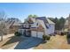 Charming two-story home featuring a stone facade, inviting front porch, and well-maintained landscaping at 2546 Summer Song Way, Buford, GA 30519
