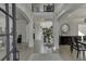 Welcoming foyer featuring hardwood floors, soaring ceilings, and elegant architectural details at 2546 Summer Song Way, Buford, GA 30519