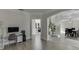 Versatile home office space with a modern desk, wood floors, and access to multiple living areas at 2546 Summer Song Way, Buford, GA 30519