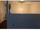A small dining room space is shown with neutral walls, a hanging light fixture, and a partial wall at 3788 Travis Trce, Decatur, GA 30032