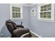 Relaxing room showcasing a modern massage chair with natural light streaming through the window at 1202 Coan Dr, Locust Grove, GA 30248