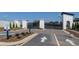 Community entrance with decorative gates, landscaping, and a welcoming sign at 1826 Butterfly Way, Marietta, GA 30066
