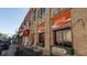 Charming street view with restaurants, awnings, and Coca-Cola signs, offering a vibrant neighborhood experience at 1826 Butterfly Way, Marietta, GA 30066