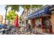 Patio seating at Millie Rae's Social House with outdoor tables and umbrellas at 1826 Butterfly Way, Marietta, GA 30066